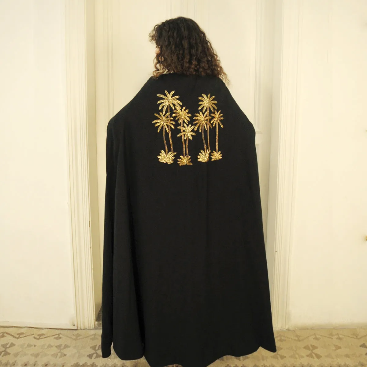 GOLDEN OASIS BLACK IMPERIAL CAPE