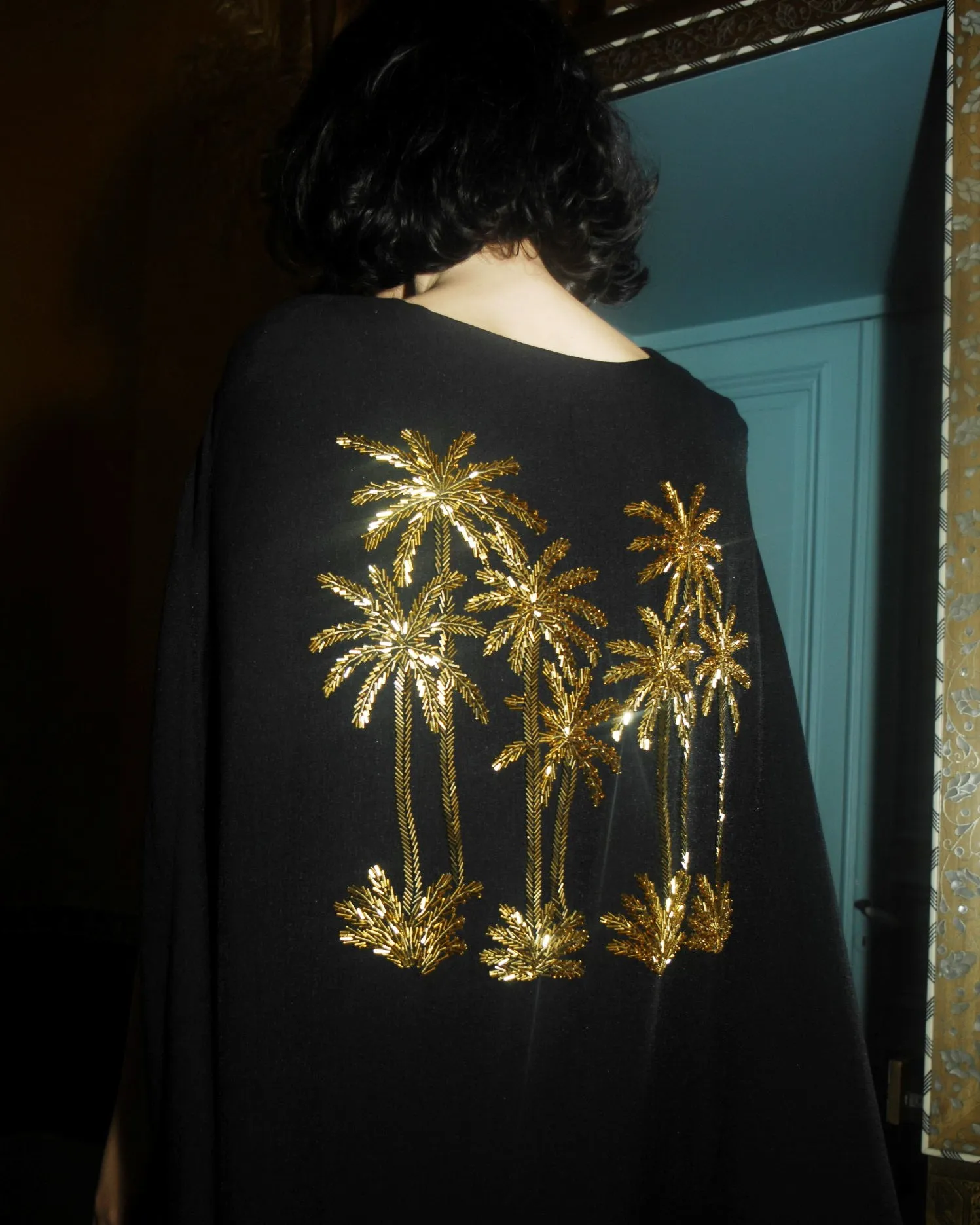 GOLDEN OASIS BLACK IMPERIAL CAPE